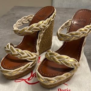 Christian Louboutin Gold Braided Espadrilles size 38 with a wooden insole.
